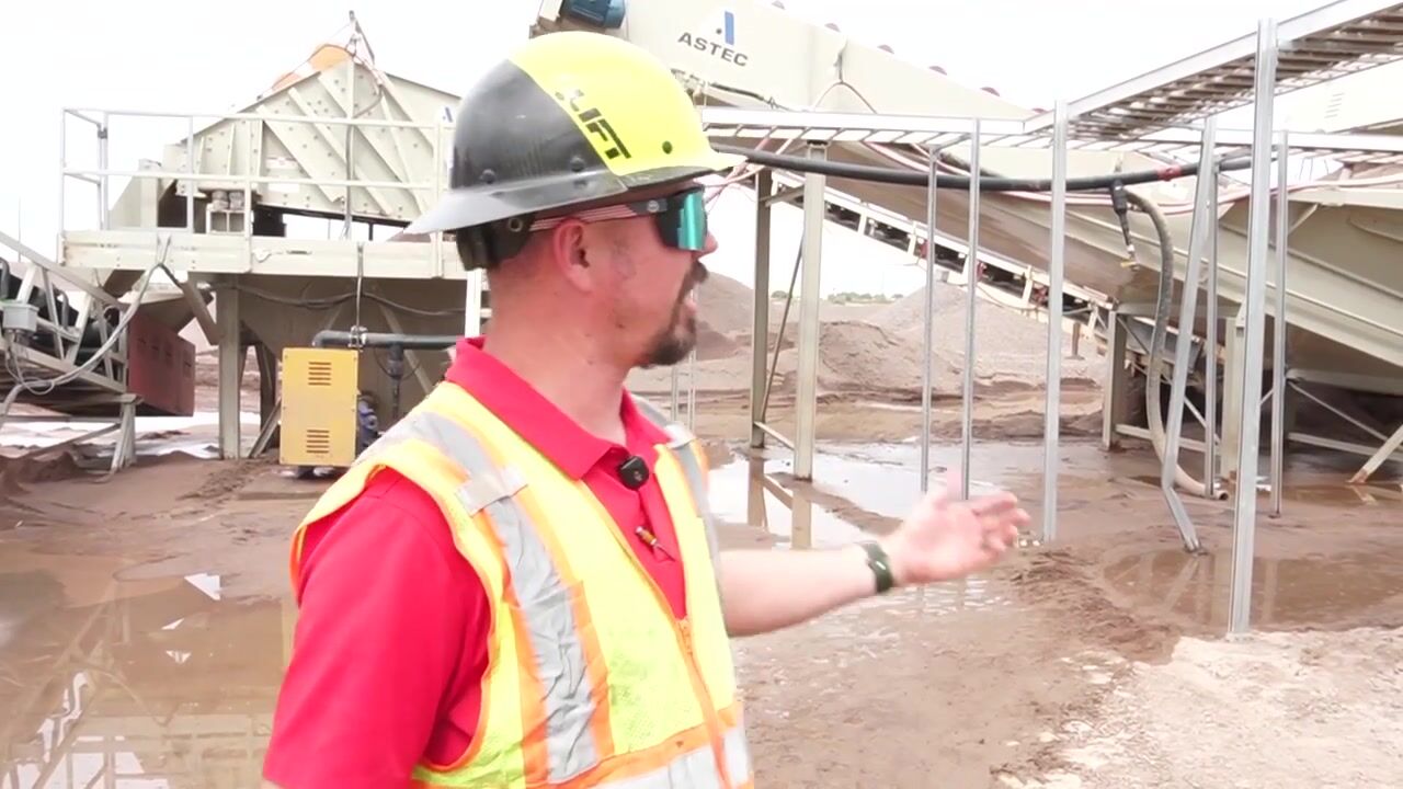 Chapman's COO at an Arizona aggregate wash plant, talking through the work